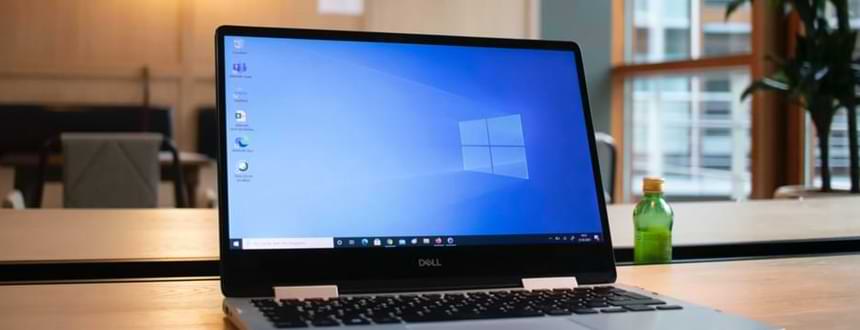 eSim PC : Un ordinateur portable Dell est posé sur un bureau